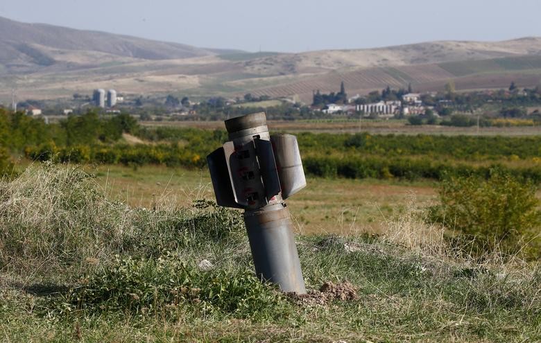 The remains of a rocket shell are seen after recent shelling during the military conflict over the breakaway region of Nagorno-Karabakh, in the town of Martuni. REUTERS/Stringer